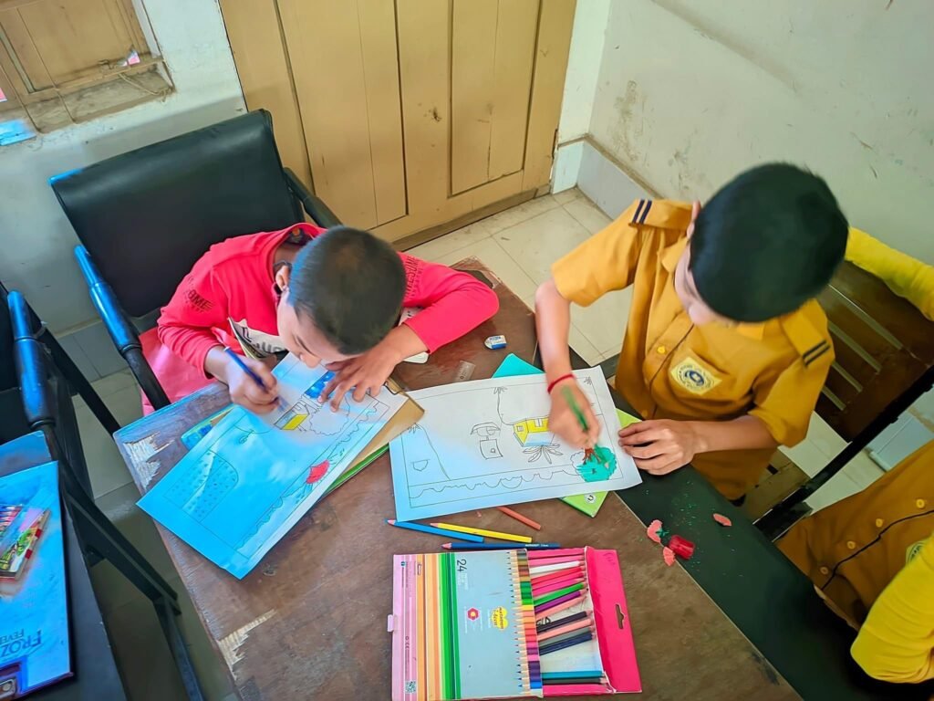 Two students drawing pictures