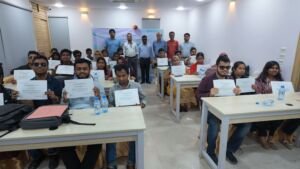 Full group photo of 30 trained youth accessibility auditors with disabilities holding their certificates alongside project organizers at the completion of the Bootcamp
