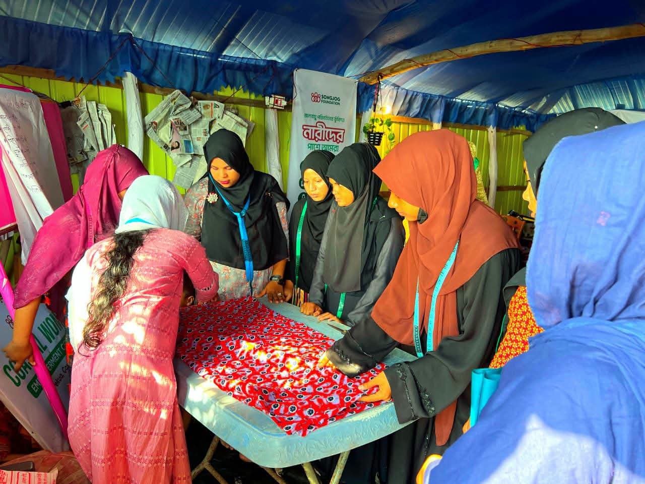 Womens and young girls are receiving sewing training